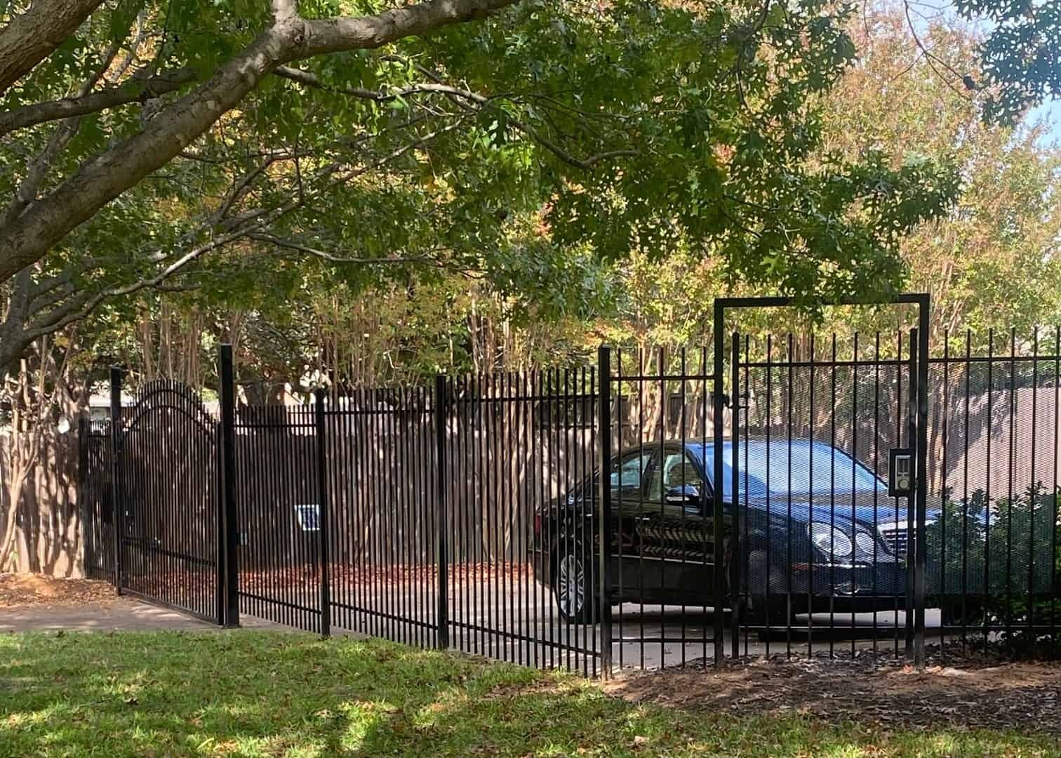 Custom black steel driveway gate